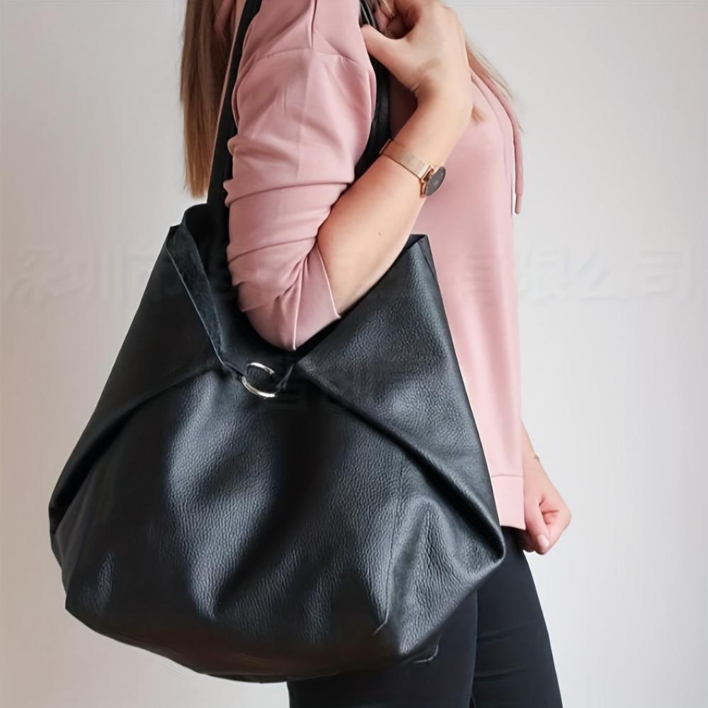 Gran bolso vintage de cuero, cómodo y atemporalmente elegante