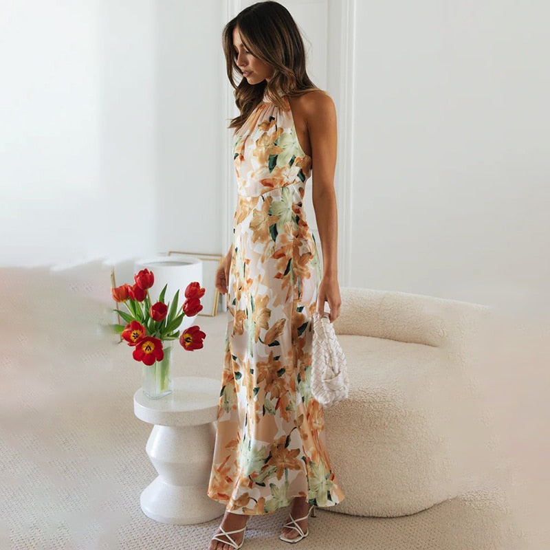 Emmie | Vestido maxi con flores y cuello halter