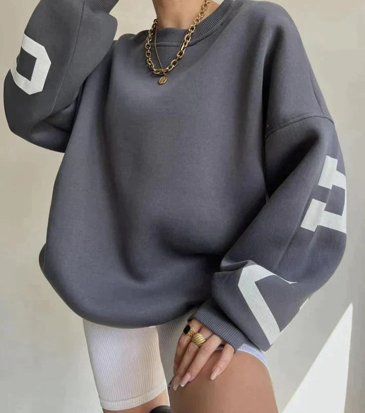 Lola™ | Date un capricho con nuestro elegante suéter oversized