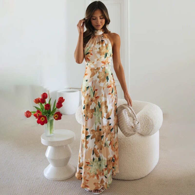 Emmie | Vestido maxi con flores y cuello halter